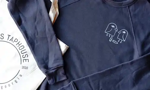 a close up of a man in a blue shirt