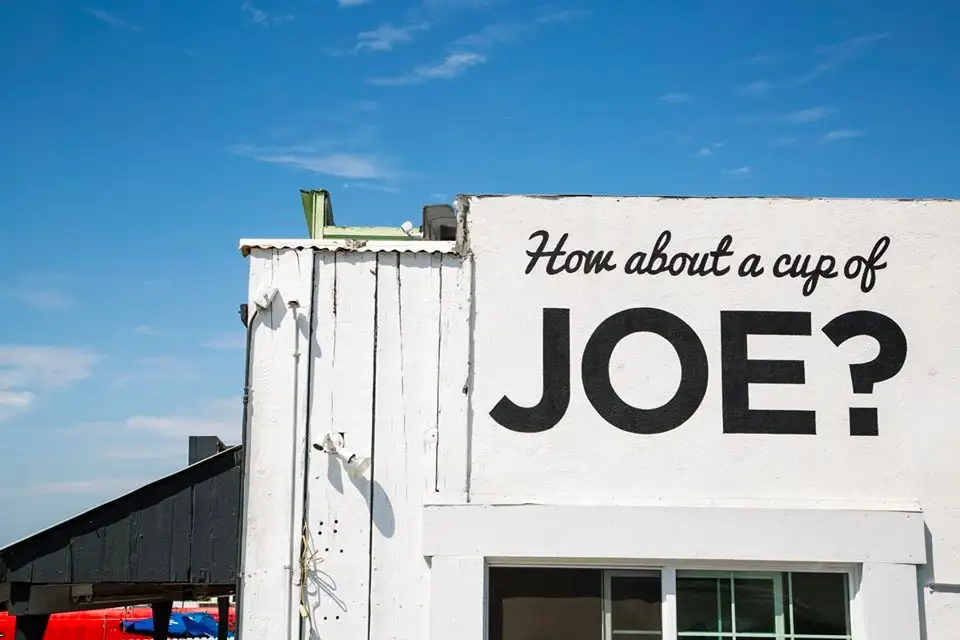a sign in front of a building