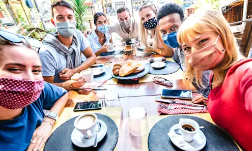 a group of people sitting at a table