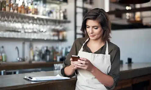 a woman sitting at a table