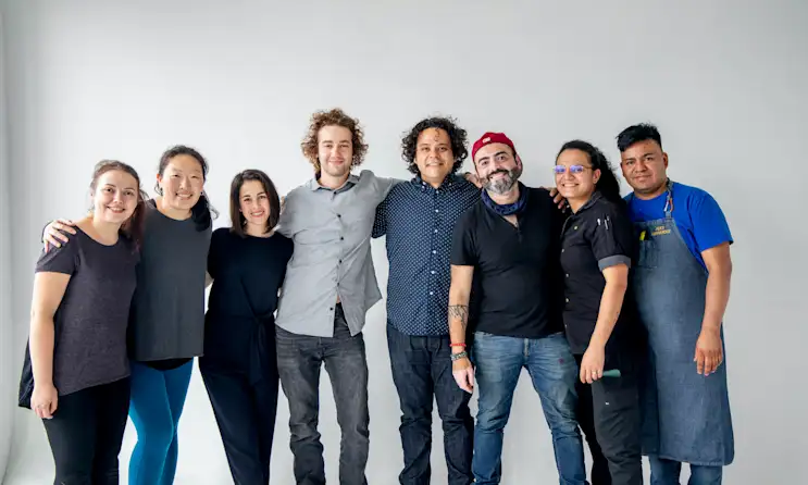 a group of people posing for the camera