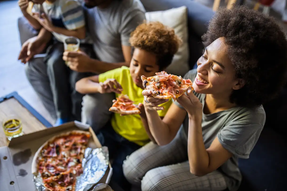 A family enjoying a meal together at home