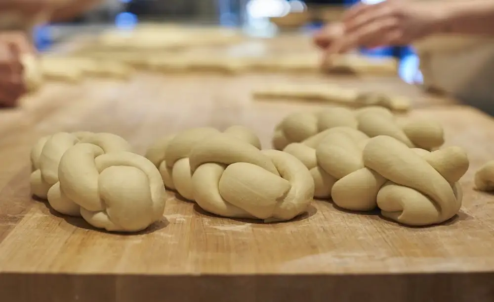 a close up of food on a wooden cutting board