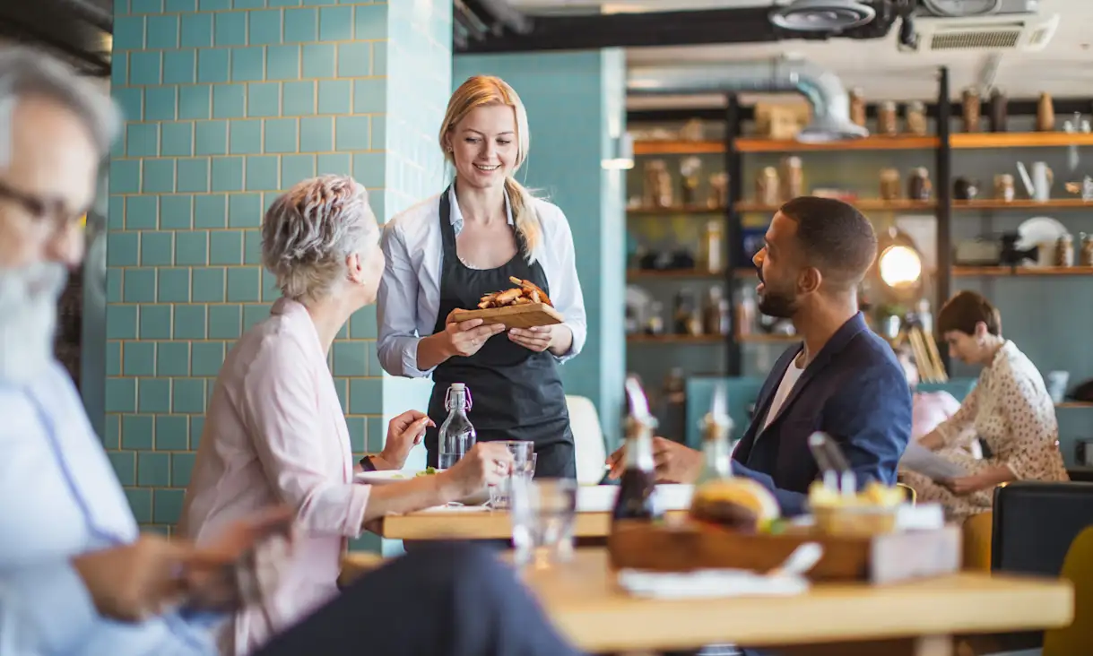 a group of people sitting at a table