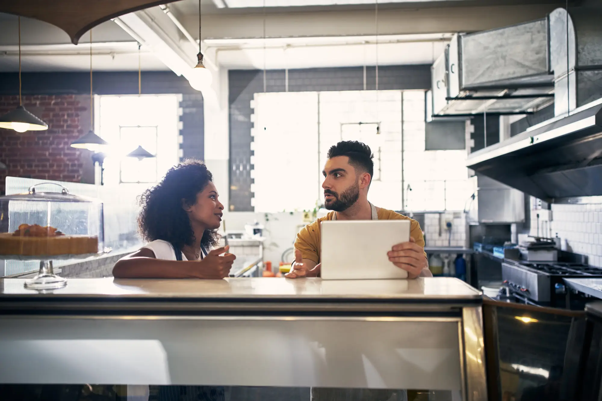 a person cooking in a kitchen