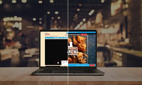 a laptop computer sitting on top of a wooden table