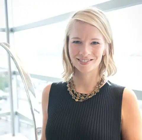 a woman smiling for the camera