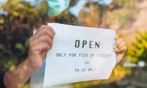 a person holding a sign