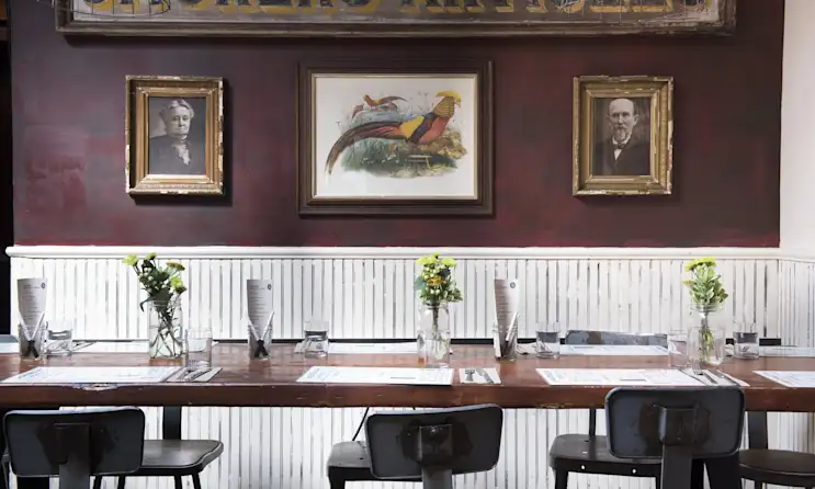 a desk with a chair in a room