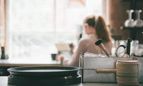 a woman sitting on a counter