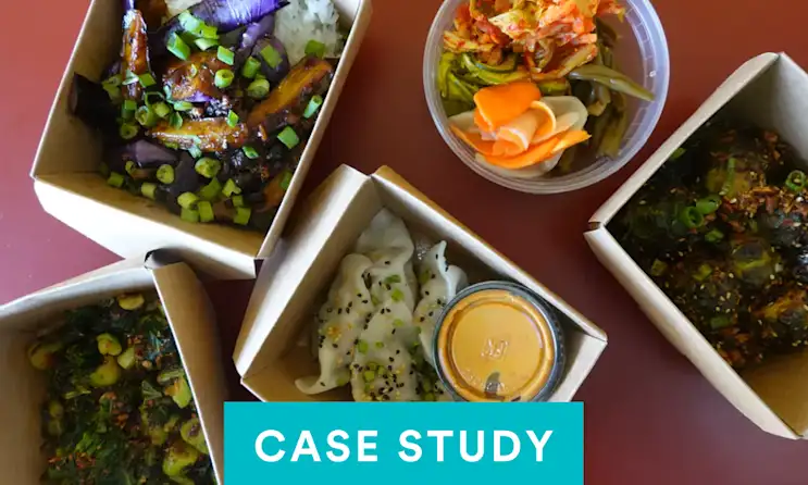 a box filled with different types of food on a table