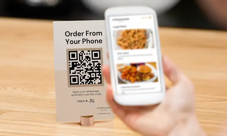A mobile device scanning a QR code