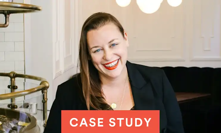 a woman who is smiling and looking at the camera