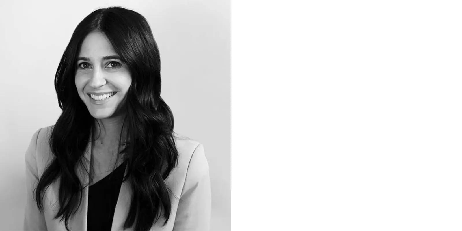 a woman who is smiling and looking at the camera