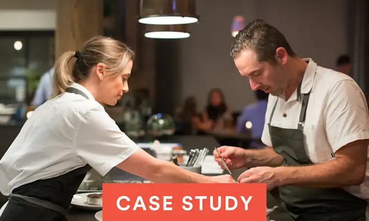 a man and a woman looking at each other