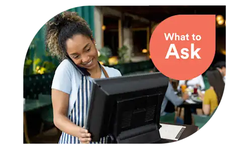 woman takes restaurant reservations while on the phone